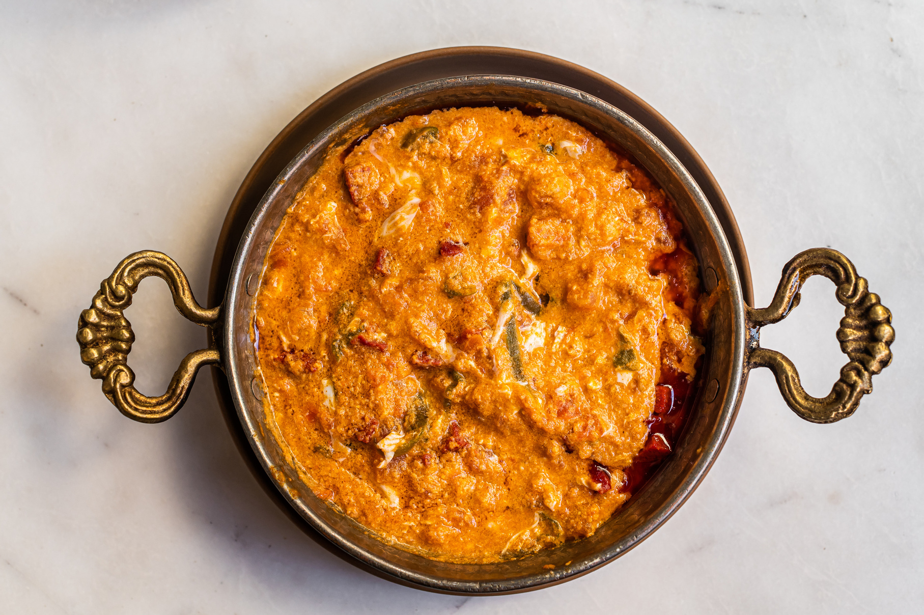 Traditional Turkish Menemen with Eggs, Sausage Sucuk and Tomatoe